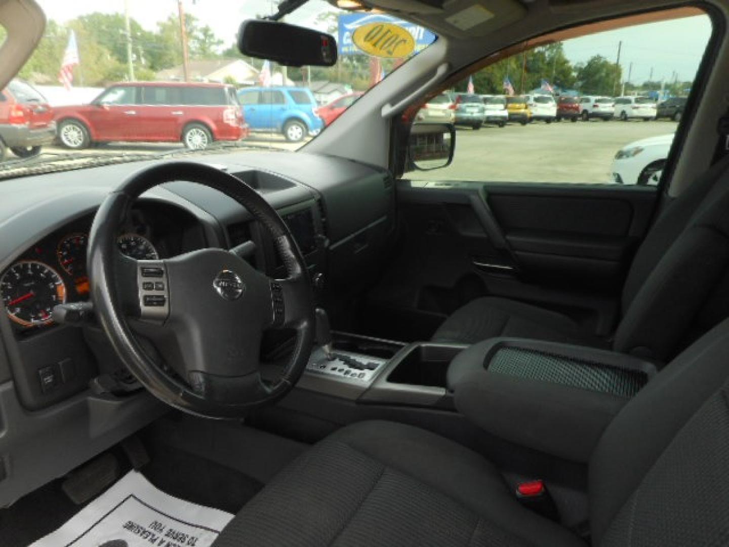 2010 WHITE NISSAN TITAN SE; LE; XE (1N6BA0ED7AN) , located at 10405 Abercorn Street, Savannah, GA, 31419, (912) 921-8965, 31.988262, -81.131760 - Photo#2